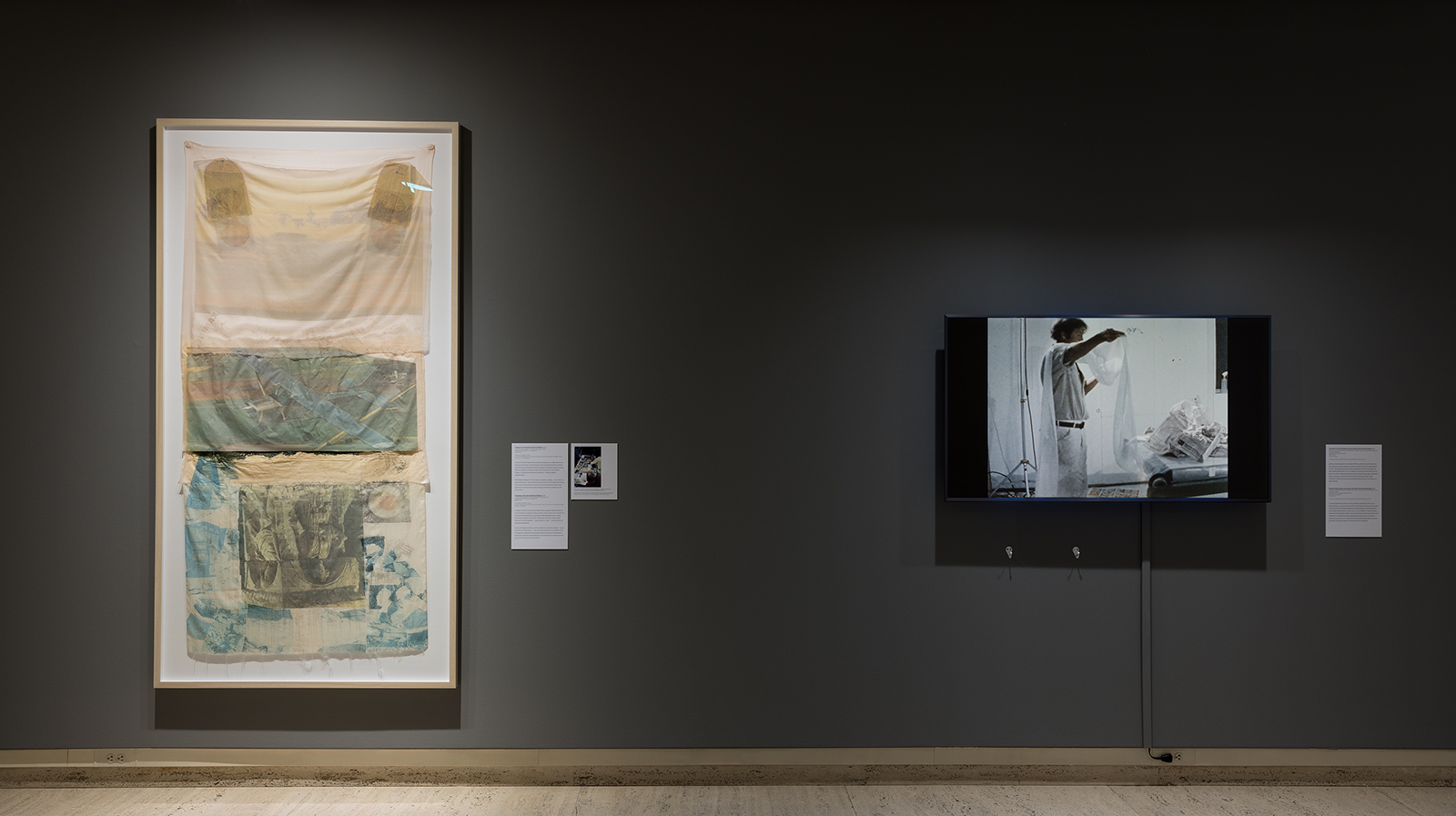 "Scrape (Hoarfrost Edition)" (1974) and a video monitor with archival footage of Robert Rauschenberg in the print studio.